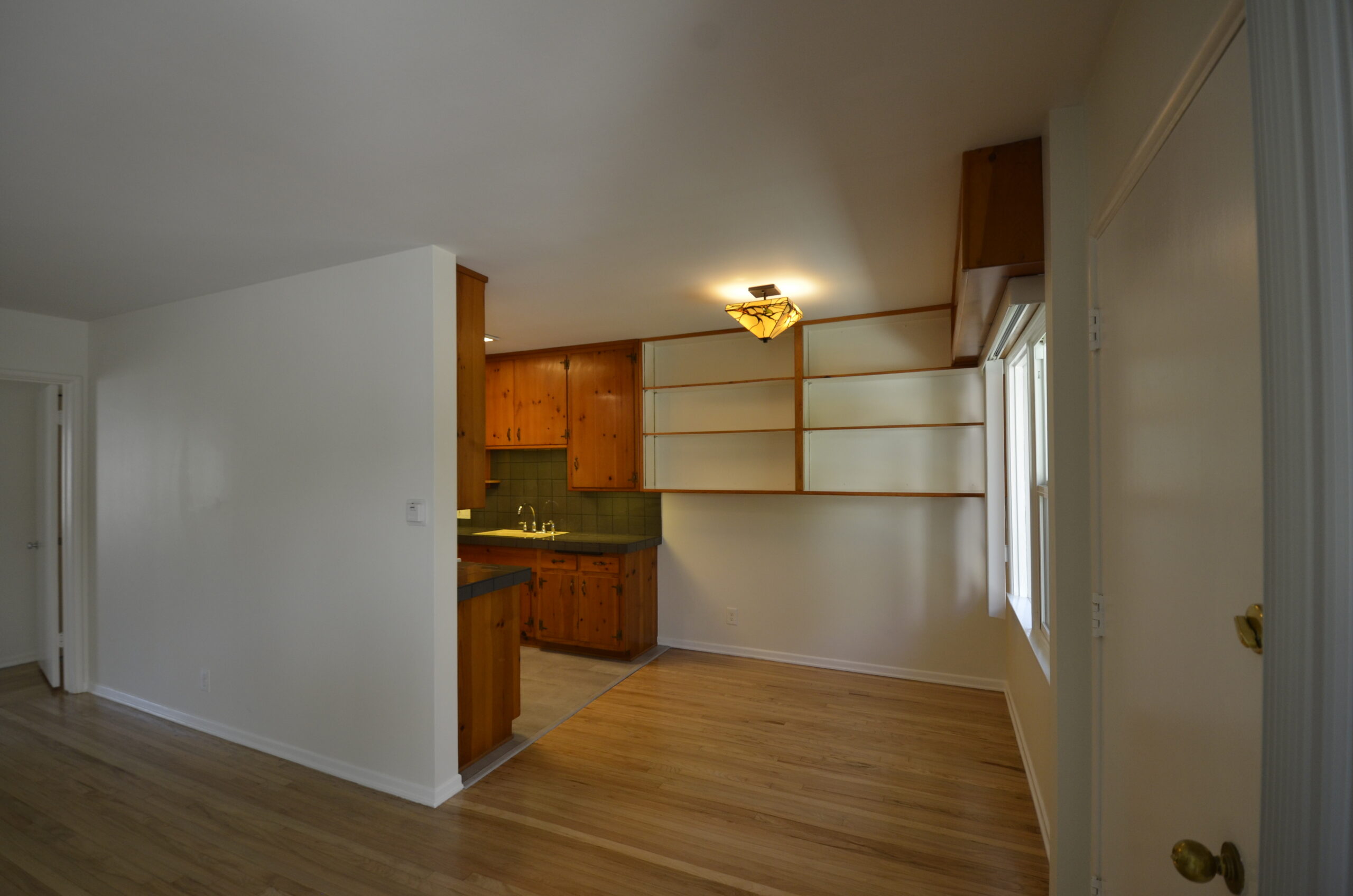 Apt 3 built in shelves in dining area